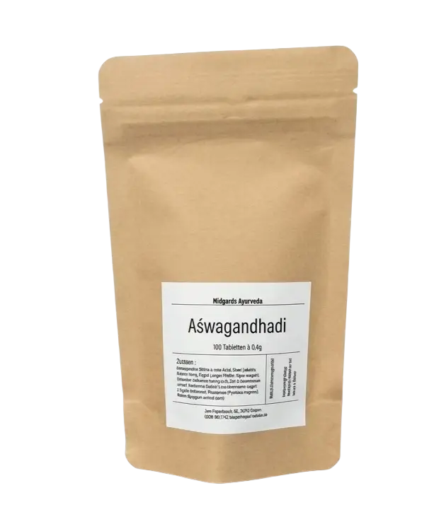 Ashwagandhadi Tabletten von Mana Shop, 100 Stück, traditionelle Ayurveda-Kräuterformel für Vitalität und Balance, auf weißen Hintergrund.