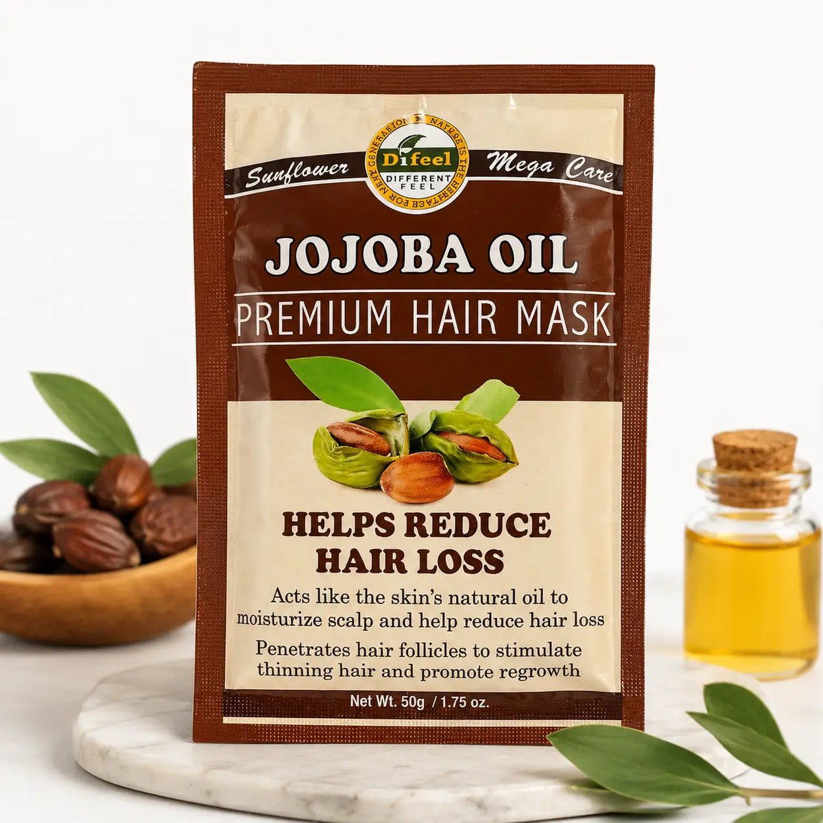 Difeel Jojoba Öl Premium Haar Maske in brauner, cremefarbener Verpackung, für gepflegtes und kräftiges Haar