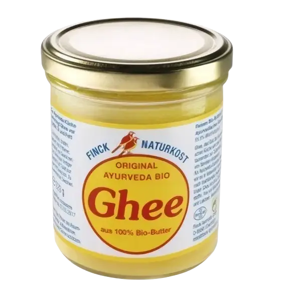 Goldenes Ayurveda Ghee von Finck, biologisches EU-Öl, in einer Glasdose, sichtbare goldene Schichtung und cremige Textur
