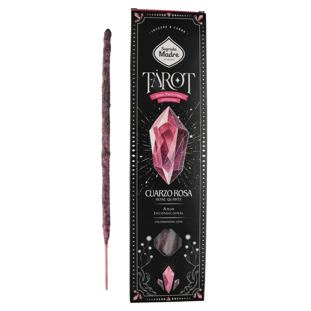 Ein einzelner dunkelvioletter räucherwerk tarot edelsteine rosenquarz wildrose räucherstab neben schwarzer und rosa verpackung mit rosenquarz design