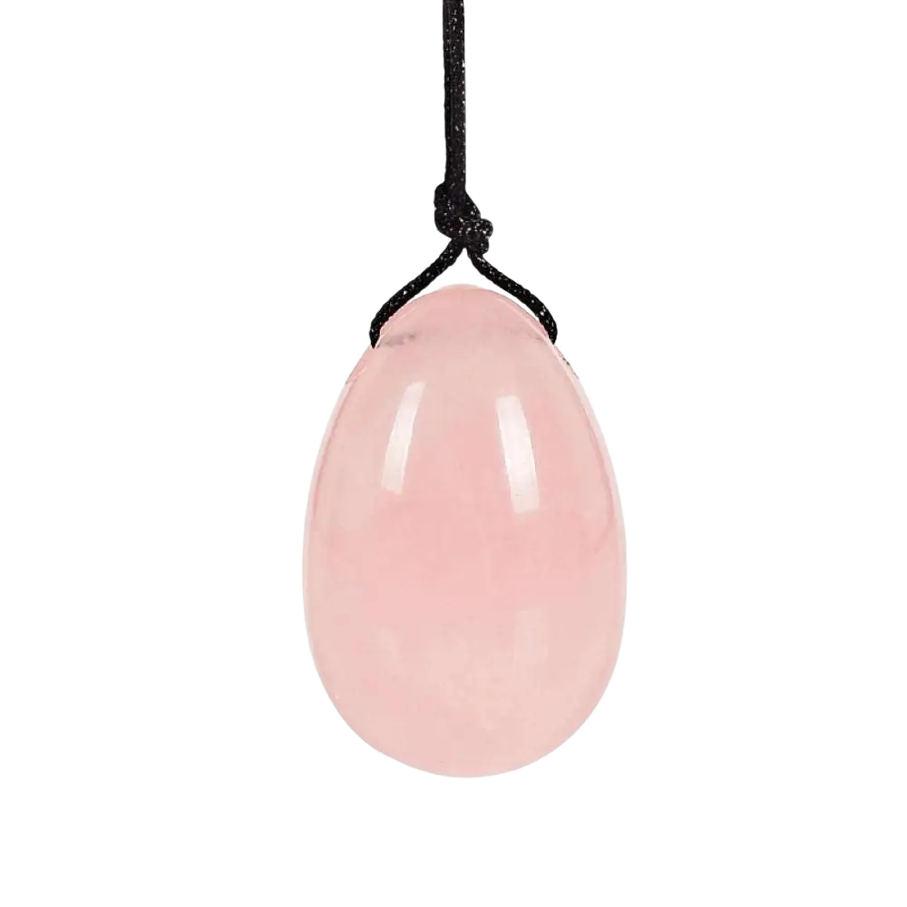 Rosenquarz Yoni-Ei mit Schnur von Mana Kendra, glatte, durchscheinende rosa Yoni-Ei für feminine Gesundheit und Energie.