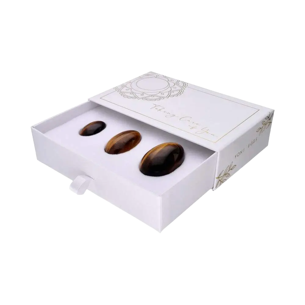 Tigerauge Yoni-Eier Set aus Tigerauge-Steinen für Kraft, Klarheit und Schutz, inklusive drei Yoniei in natürlichem Design.