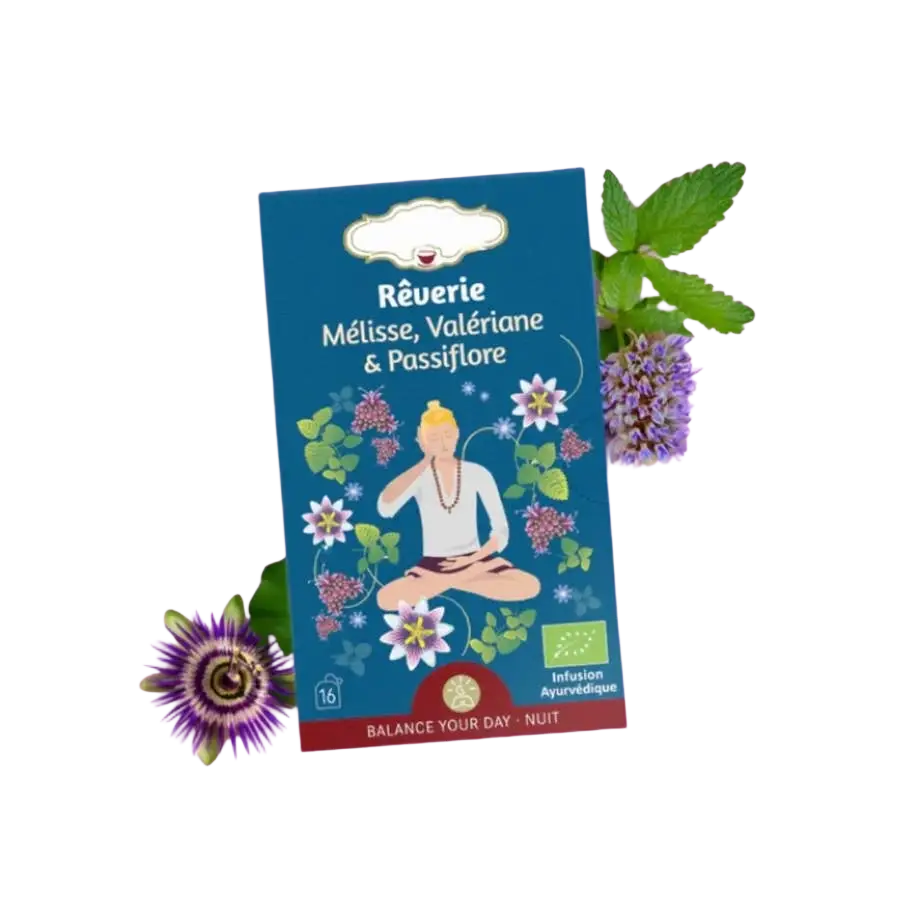 Zen'Arome Bio-Kräutertee „Reverie“ in einer Tasse, ideal für einen ruhigen, wohltuenden Abend, mit frischen Kräutern.