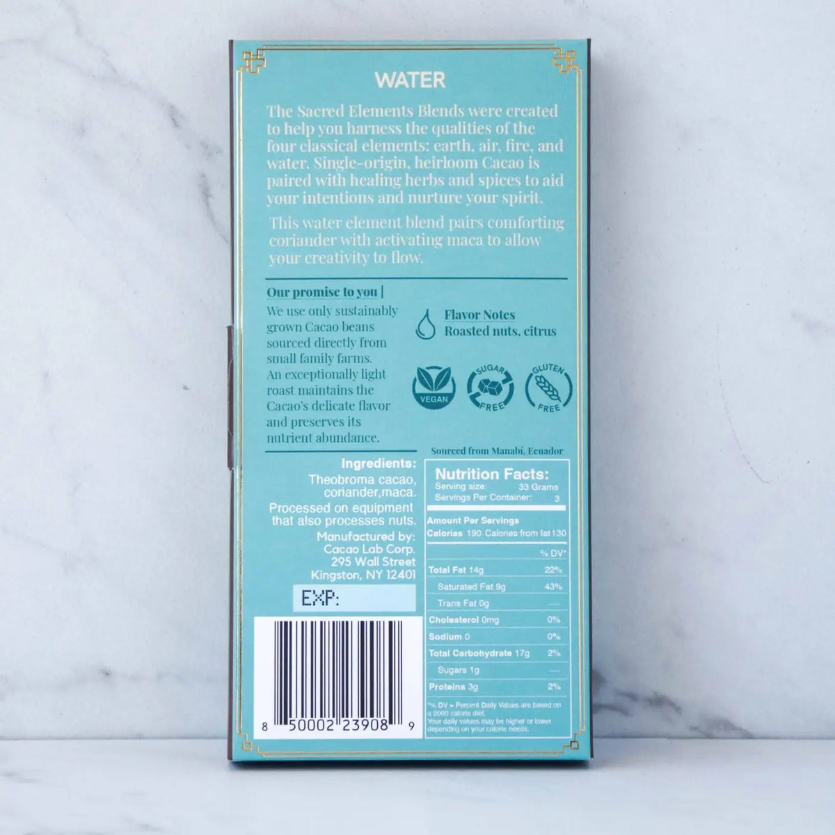 Zeremonieller Kakao Cacao mit Wasserelement, Koriander und Maca, in einer stilvollen Verpackung, für besondere Genussmomente.