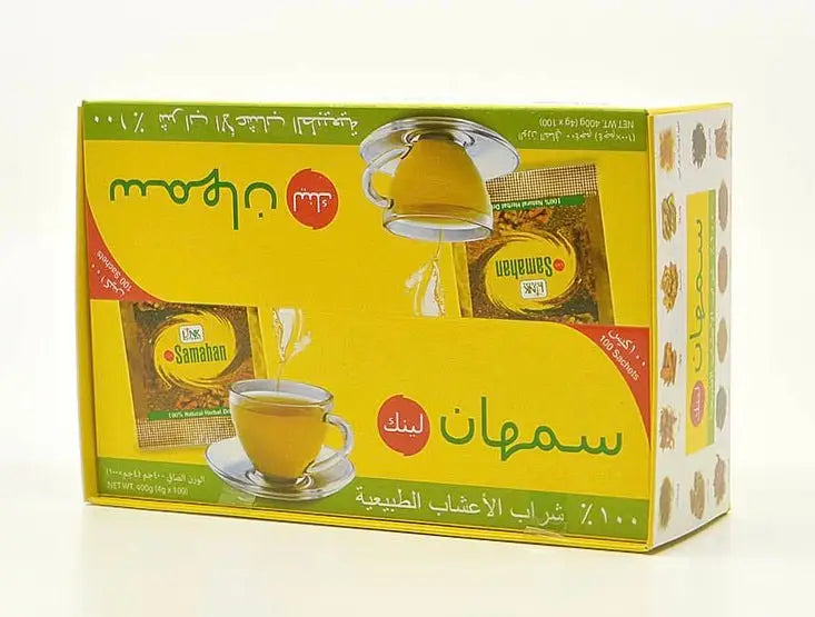 Gelbe samahan karteibox mit arabischem text und teetassen mit goldbraunem tee als ayurvedische kräuterformel im mana shop