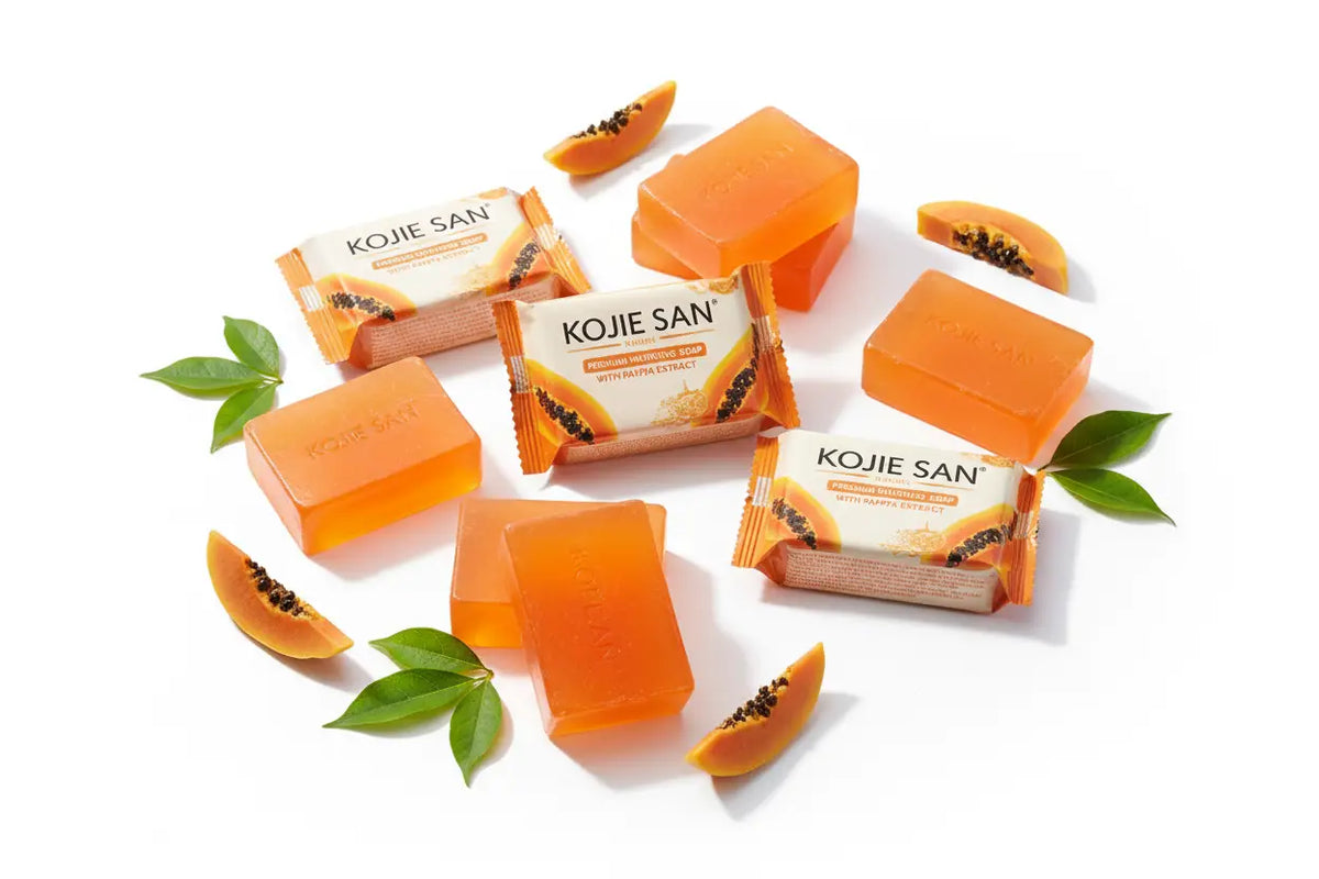 Orange papaya duftseifen von kojie san in orange weißer verpackung mit tropischen früchten hautaufhellende pflege mana shop