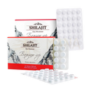 Weiße blisterpackungen mit runden tabletten neben schachteln shilajit altai mumio bergbalsam pure mumio