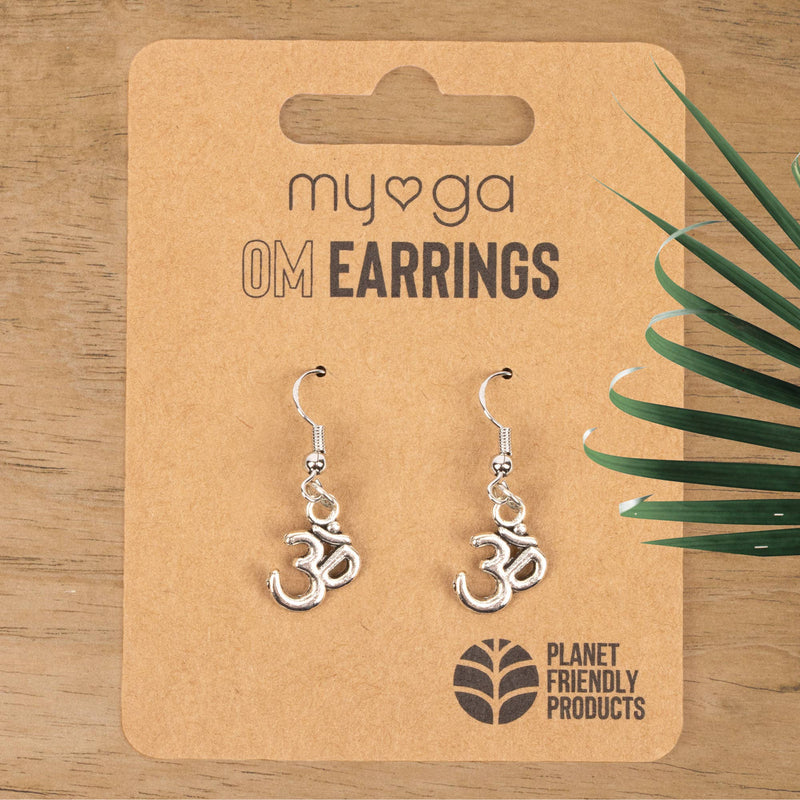 Hamsa earrings with lotus and Om – symbolism and style combined