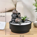 Ein Zen-Garten-Zimmerbrunnen mit Steintöpfen und Produktmaßen von 21 cm.