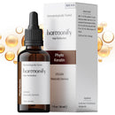 Eine dunkle Glasflasche mit Pipette und die weiße Schachtel für Harmonify Phyto Keratin (Hair Perfection). Das vegane, natürlich gewonnene Produkt ist "Dermatologisch getestet" und enthält die Gebrauchsanweisung und den Hauptbestandteil (Gluadin Kera-P LM) auf der Schachtel.