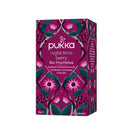 Eine dunkelviolett-pinkfarbene Schachtel Pukka "Night Time Berry" Tee, verziert mit Illustrationen von Beeren und Blumen.