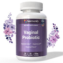 Eine lila Dose Harmonify Vaginal-Probiotikum, dekoriert mit violetten und rosa Blumenillustrationen.
