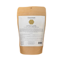 Ein brauner Papierbeutel mit Paavani Ayurveda Baumwollflanell für Rizinusöl-Packungen.