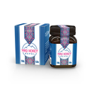 Ein Glas und die passende Schachtel Mad Honey Nepal mit blauem Design und Berg-Logos.