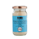 Ein Glas NIMI AYURVEDA Ashwagandha Churna Premium, ein ayurvedisches Gewürzpulver. Auf dem Etikett stehen der Inhalt von 100 g, die Aufschrift „von Natur aus Vegan“ und das BDIH-Zertifizierungslogo.