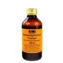 Eine 200 ml Braunglasflasche NIMI AYURVEDA Balaswagandhadi Thailam Ayurvedisches Massageöl mit goldfarbenem Deckel, freigestellt auf weißem Hintergrund.