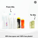 Ein visueller Vergleich, der traditionelle sperrige Flüssigwaschmittel und Weichspüler links ("From this") einem kompakten Karton mit Cosmeau Fresh Spring Wäscheduft-Booster rechts ("To this") gegenüberstellt, was 85% weniger Platz und 100% weniger Plastik hervorhebt.