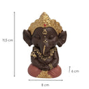 Eine dunkelbraune Lord Ganesha Statue mit goldener Dekoration und Maßen: 11,5 cm hoch, 8 cm breit und 6 cm tief.