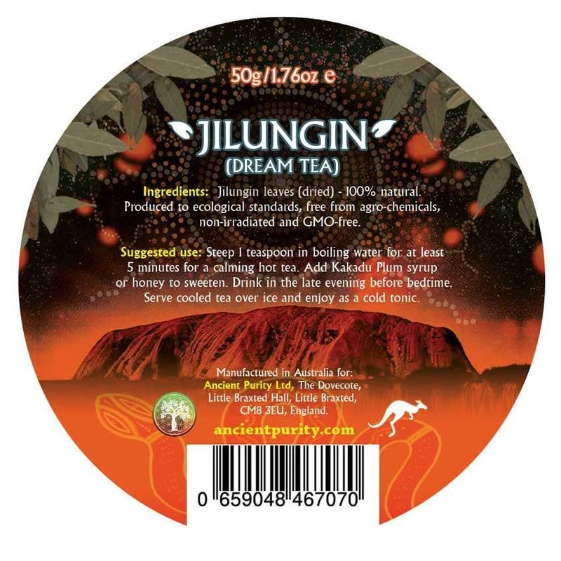 Ein rundes Produktetikett für "Jilungi (Dream Tea)" mit einer nächtlichen Landschaft, die eine große Felsformation und punktförmige Muster zeigt. Das Etikett enthält Informationen zu den Inhaltsstoffen, der empfohlenen Verwendung und dem Hersteller.