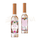 Eine klare glasflasche mit kupferfarbenem verschluss und bunter etikette von soul sicks mit fast luck cleansing water und energizing essences für positive vibrationen