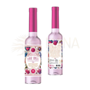 Rosa glasflasche mit magentafarbenem deckel und verziertem etikett für florida love spell spell cleansing water