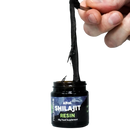 Altai Shilajit Resin von Feel Supreme, 50 g, mit 80+ Spurenelementen, als Nahrungsergänzung in einer transparenten Packung.