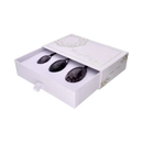 Drei Amethyst Yoni Eier aus Schmuck mit Loch und Schnur, elegant und handgefertigt, als spiritueller Schmuck und Accessoire.