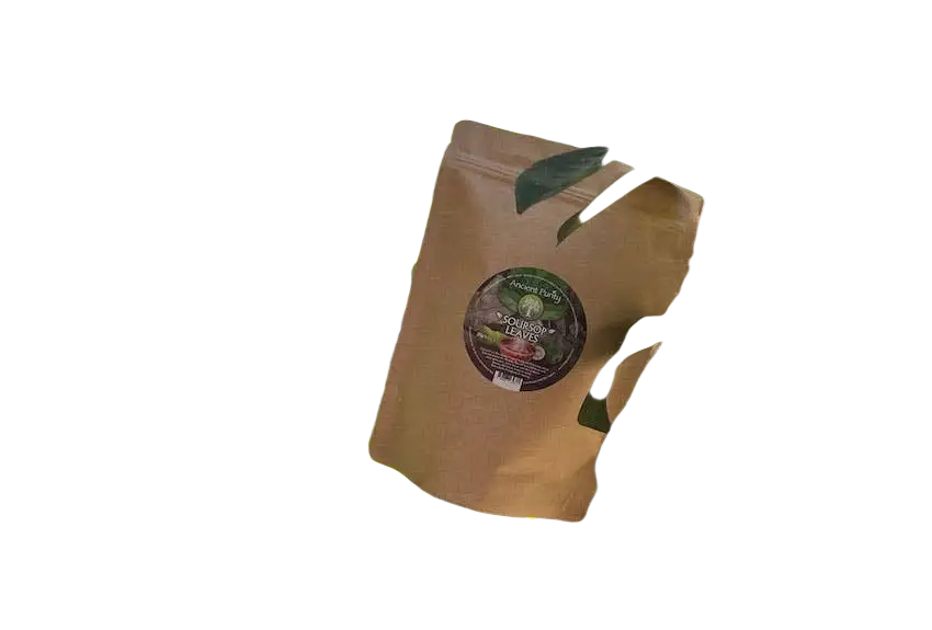 Ancient Purity Soursop-Blätter Tee in brauner Papierverpackung, sichtbare Aufschrift, natürliche Blätter für Tee-Zubereitung.