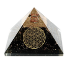 Klarer orgonit pyramide mit schwarzem turmalin basis und blume des lebens design mit kupferspulen und goldglitter