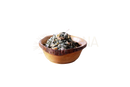 A rustikaler holzschale mit einem getrockneten grünen und gelben kräutermix von ayamani naturals claritea pineal gland tee