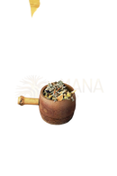 A rustic wooden spoon with a sacral chakra herbal mix by ayamani naturals beside orange flowers on weathered wood