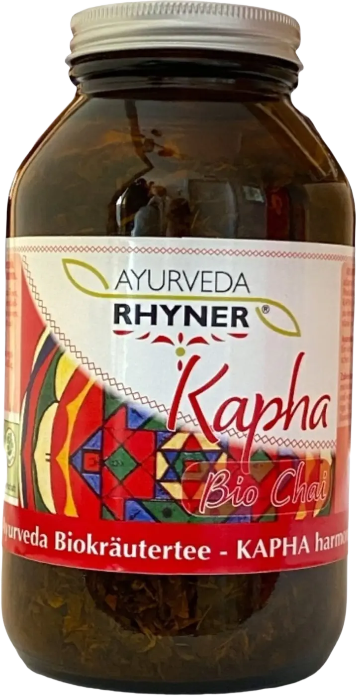 Bio Kapha Chai Tee von Rhyner in braunem Glasgefäß, aromatischer Ayurveda Tee, 100g, ideal für gesunde Getränke.
