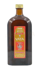 Dunkles bernsteinfarbenes glasfläschchen mit goldverschluss und rotem etikett von vata ayurveda rhyner dhanvantara thaila ayurvedisches massageöl