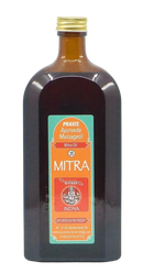 Eine dunkle bernsteinfarbene glasflasche mit goldverschluss und orange-türkis etikett der marke mitra für ayurveda rhyner mitra massageöl