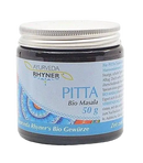 A dark glass jar with a silver lid and a light blue floral label of ayurveda rhyner pitta bio masala 50g cooling spice