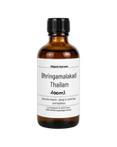 Ein 100ml bernsteinfarbenes glasfläschchen mit schwarzem schraubverschluss ayurvedisches kopföl bhringaraj tailam kühlend und nährend