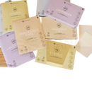 Verpackte cosmeau wäschetücher in pastellfarbenen boxen mit frühling lavendel und duftfrei, bamboozy x cosmeau aktiviert durch reibung