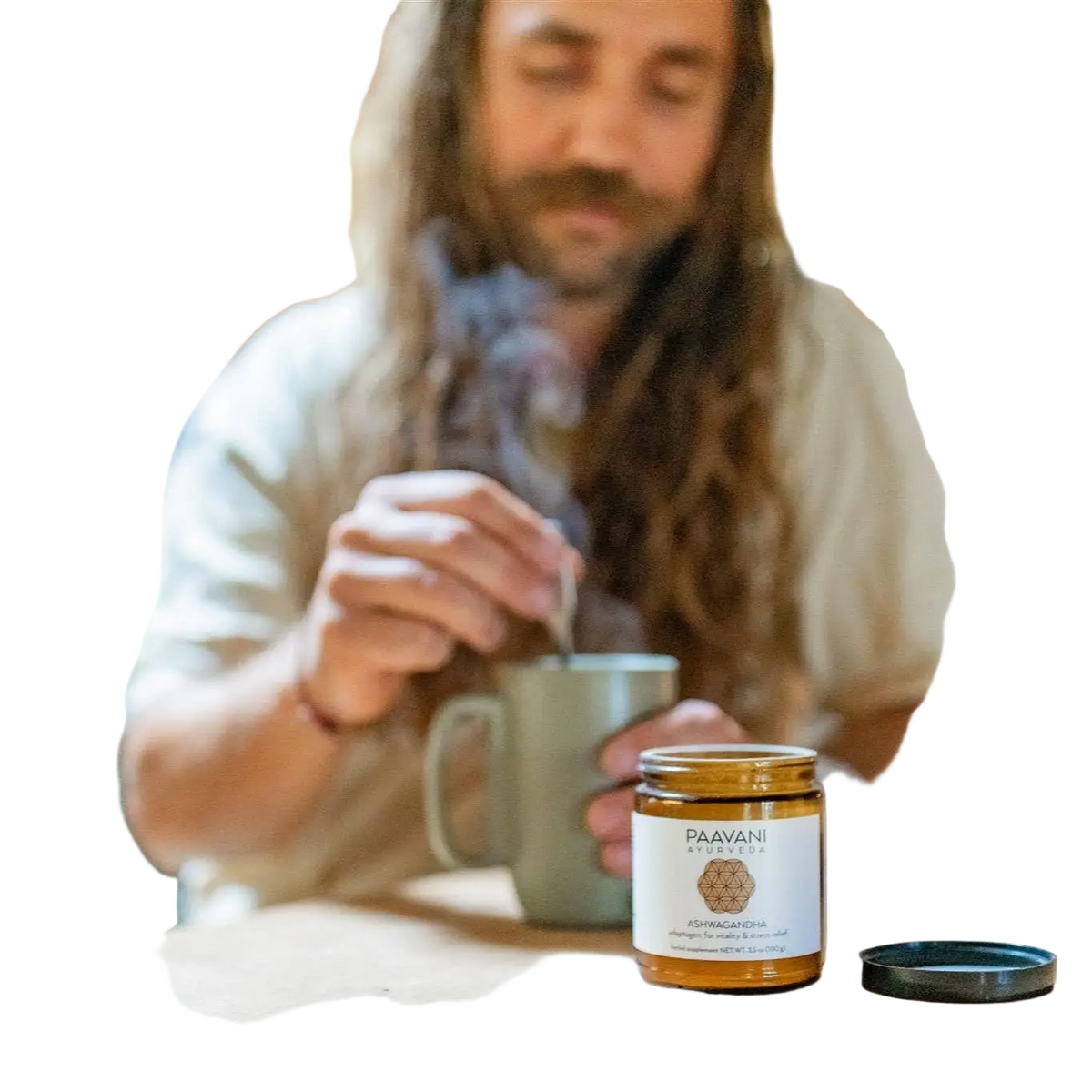Eine glasflasche mit weißem etikett und schwarzem deckel enthält bio ashwagandha pulver von paavani ayurveda für energie und vitalität