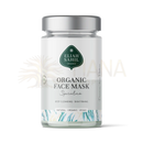 Ein klarer glasbehälter mit silberdeckel enthält die bio gesichtsmaske spirulina mit algenextrakt und heilender tonerde