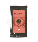 Bio kala namak grobes schwarzsalz im schwarzen wiederverschließbaren beutel von cosmoveda für ayurvedische küche