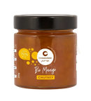 Ein glas bio mango chutney von cosmoveda mit schwarzem deckel und orangefarbenem etikett für milde currypaste und indian curry