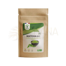 Braune kraftpapiertüte mit 50g bio matcha pulver fein gemahlen von manashop mit grün weißem etikett und schwarzer schale