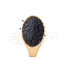 Ein holzlöffel gefüllt mit schwarzen schwarzen kümmelsamen ganz aus bio demeter qualität von sonnentor schwarzkümmel bei mana shop