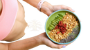 Bio spirulina tabletten mit einem grünen smoothie bowl mit kiwi goji beeren granola und chia samen in blauem keramikschüssel