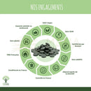 Stack of dark green circular vegan tablets of bio spirulina und chlorella mix tabletten with organische spirulina und