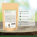 Beige papiertüte mit grünem etikett auf der rückseite mit dosierungsanleitung für bio-spirulina und vitamin c tabletten