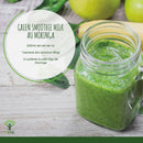 Bio-Moringa-Pulver von Bioptimal, veganes Nahrungsergänzungsmittel in einer offenen Packung mit grünen Moringa-Blättern