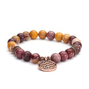 Mala Armband mit Dotter Stein und Blume des Lebens Muster, Schmuckstück von Bodynova, handgefertigt und detailreich gestaltet.