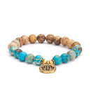 Mala Armband mit Jaspis und Türkis aus Modeschmuck, Bodynova, detailreiche Perlen auf elastischem Band sichtbar