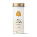 Eine weiße zylindrische Flasche mit goldenem Deckel von "ELIAH SAHIL ORGANIC BIO PULVER SHAMPOO Kamille FÜR KINDER" mit niedlichen Tierillustrationen am unteren Rand.